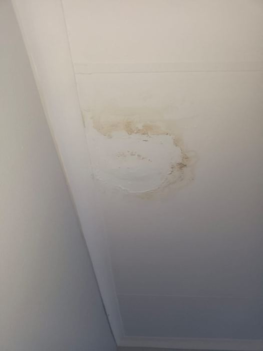 Ceiling water damage from hidden leak signs